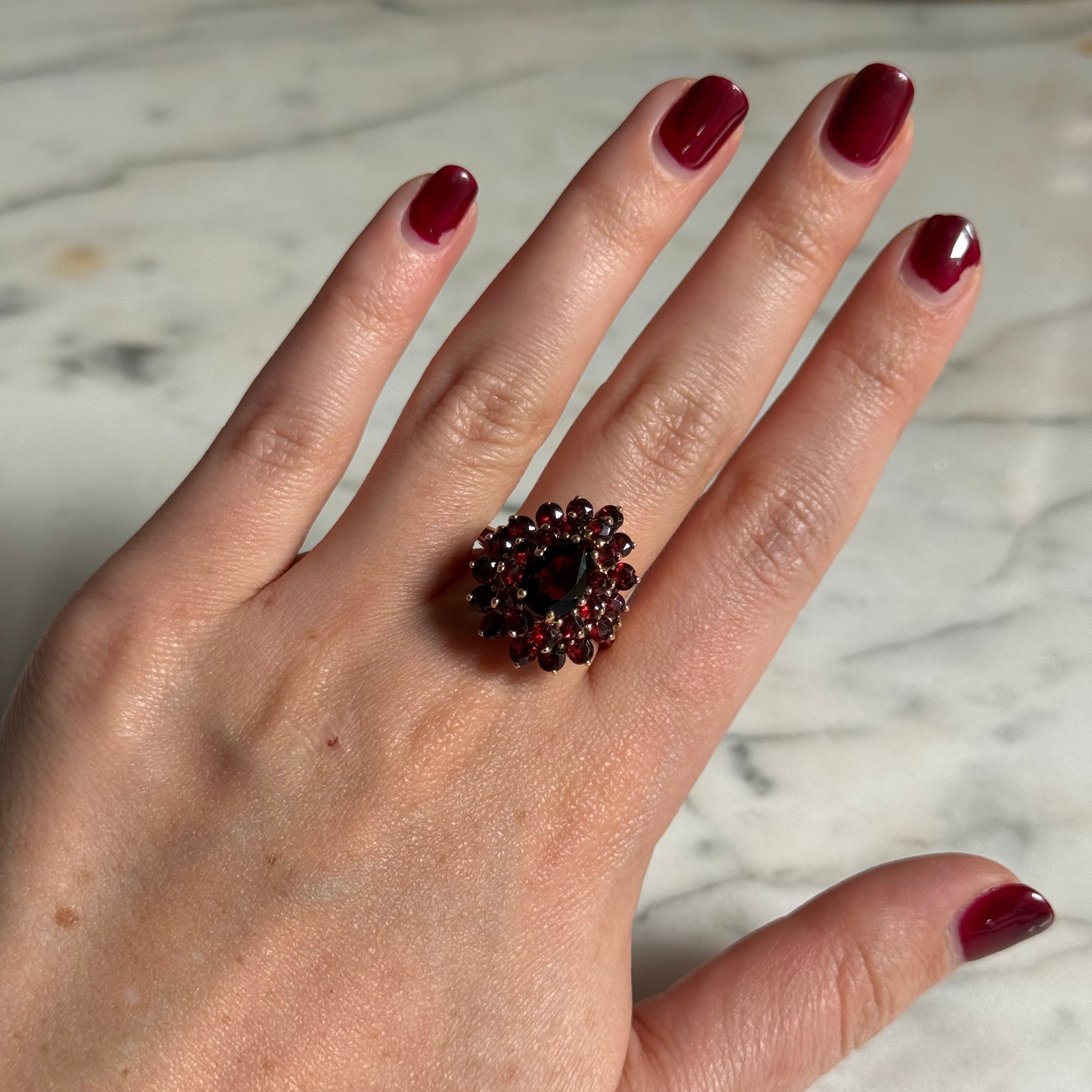 Anticipo de Anillo de granate en oro de 14k