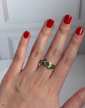 Anillo de esmeraldas con diamantes naturales en oro de 18k