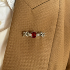 Broche de granate con diamantes naturales