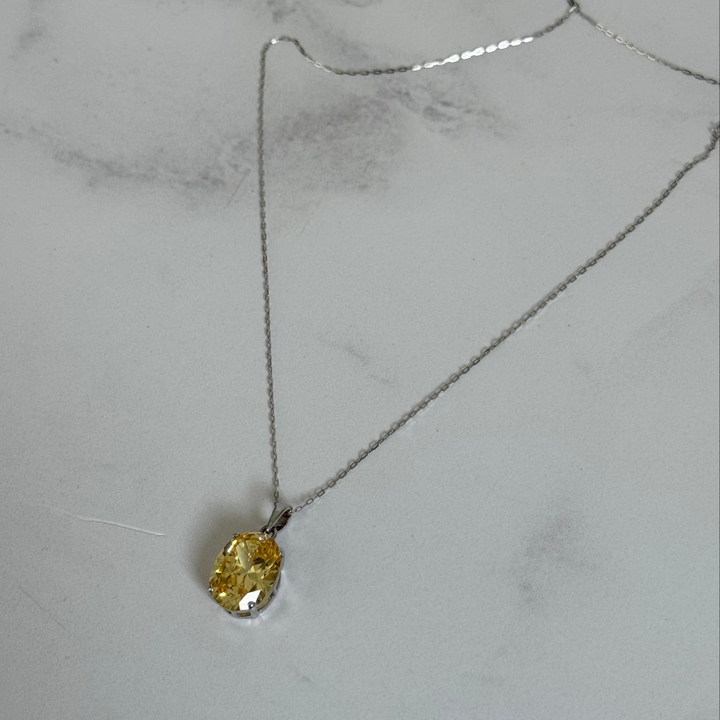 Dije de citrina ovalado